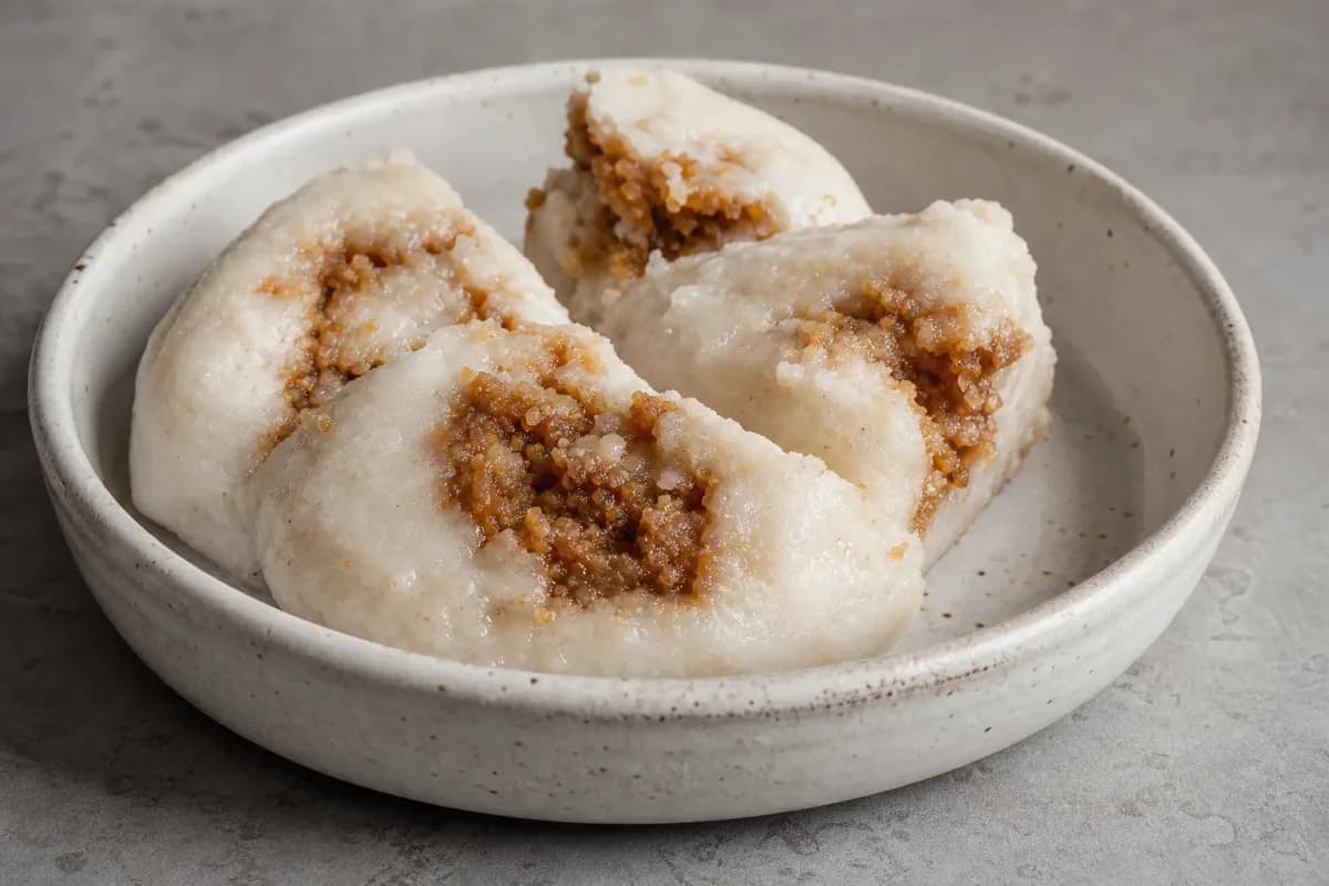 Bangladeshi Bhapa Pitha with Coconut and Date Molasses
