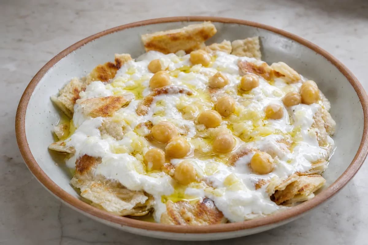 Jordanian Fattet Hummus with Yogurt, Chickpeas, and Crispy Pita
