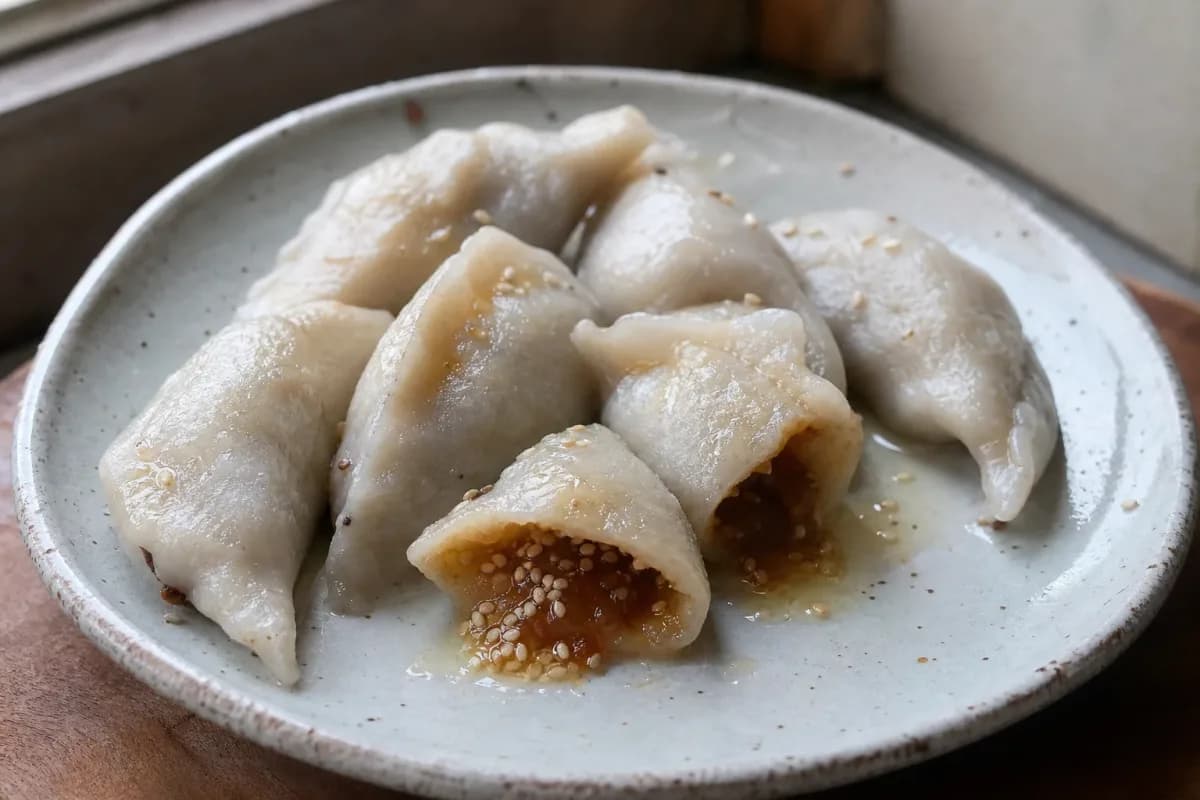 Nepalese Yomari with Sweet Chaku and Sesame Filling