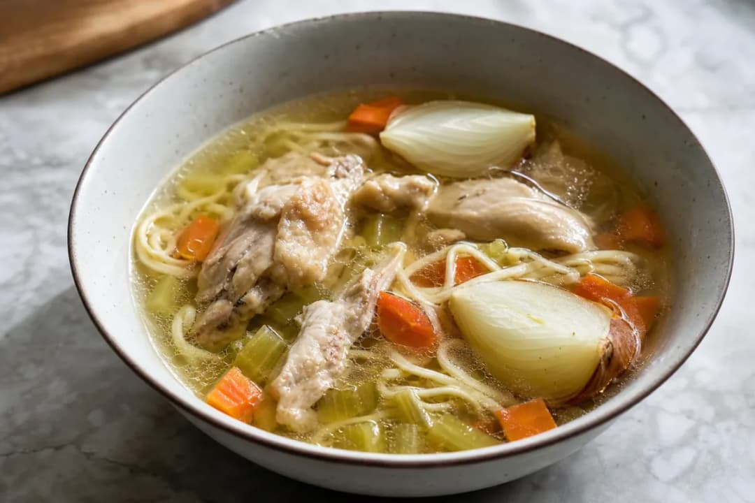 Polish Rosół Chicken Soup with Noodles and Fresh Herbs
