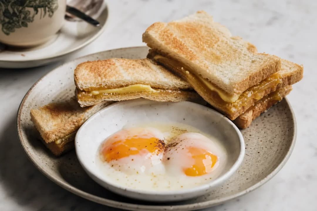 Traditional Singapore Kaya Toast with Soft-Boiled Eggs Breakfast